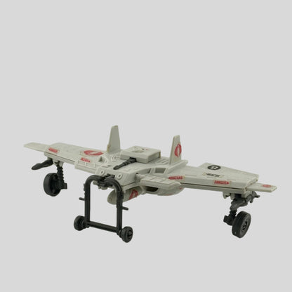 Light grey airplane-like wings with grey wheels & landing gear, red snake decals throughout, 3 bombs suspended on bottom. 