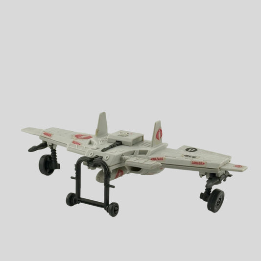 Light grey airplane-like wings with grey wheels & landing gear, red snake decals throughout, 3 bombs suspended on bottom. 