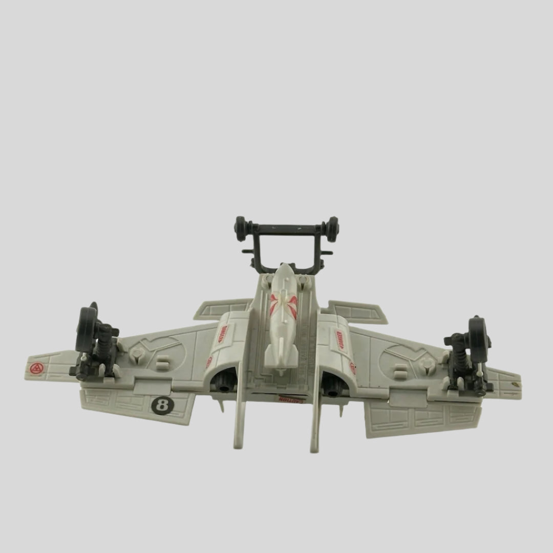 Light grey airplane-like wings with grey wheels & landing gear, red snake decals throughout, 3 bombs suspended on bottom.