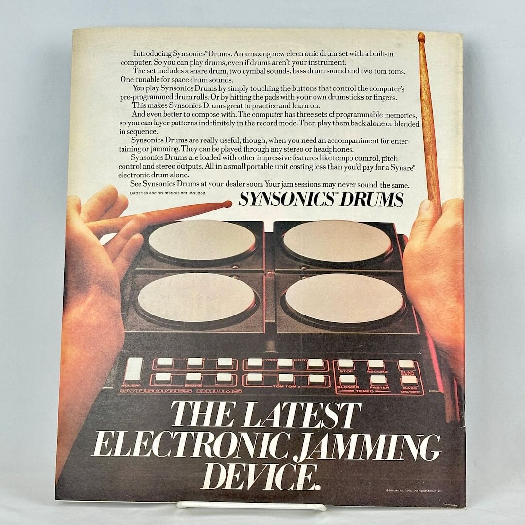 Back cover of magazine with full page ad for Synsonics Drums with image of electronic drum set with text. 