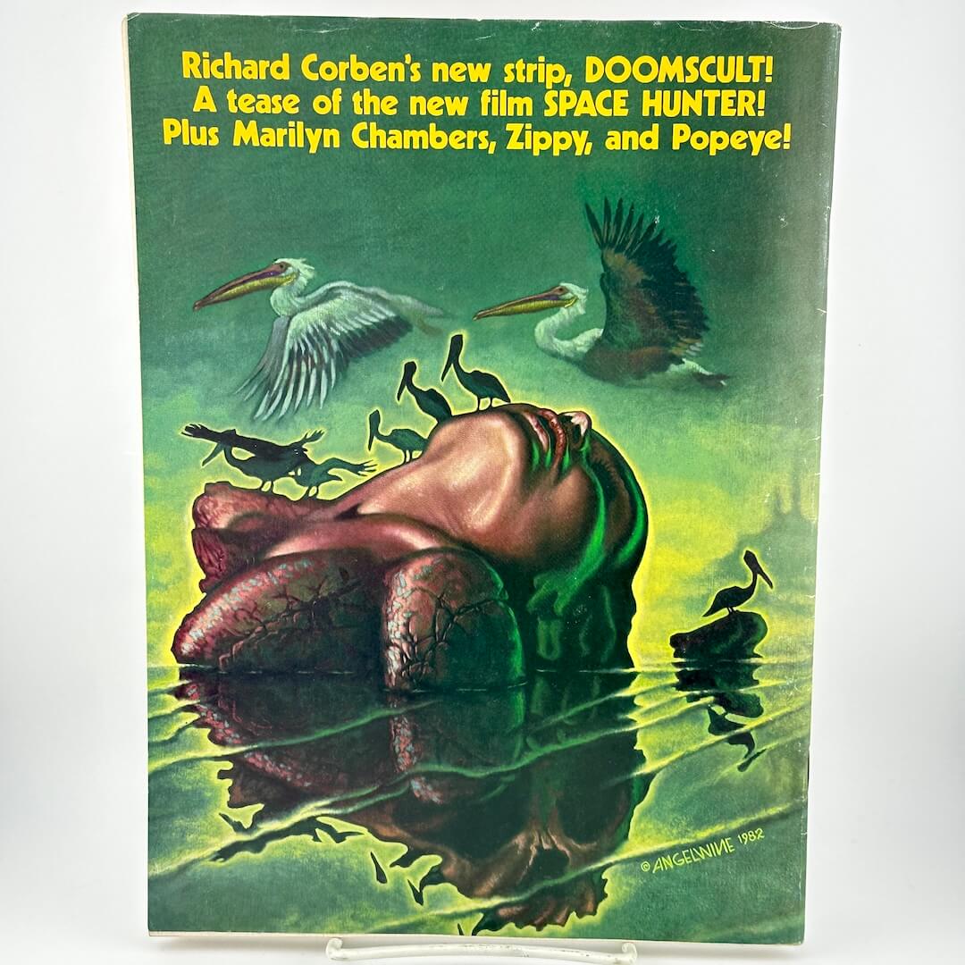 Back cover of magazine with woman emerging from pool of water with birds around her. 