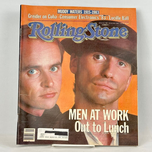 Vintage issue of Rolling Stone magazine with two men pictured with orange background. 