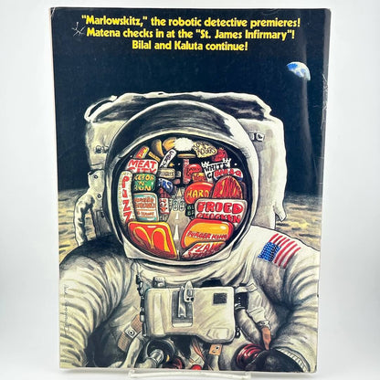 Back cover of magazine with illustration of astronaut on moon with neon signs reflected in visor. 