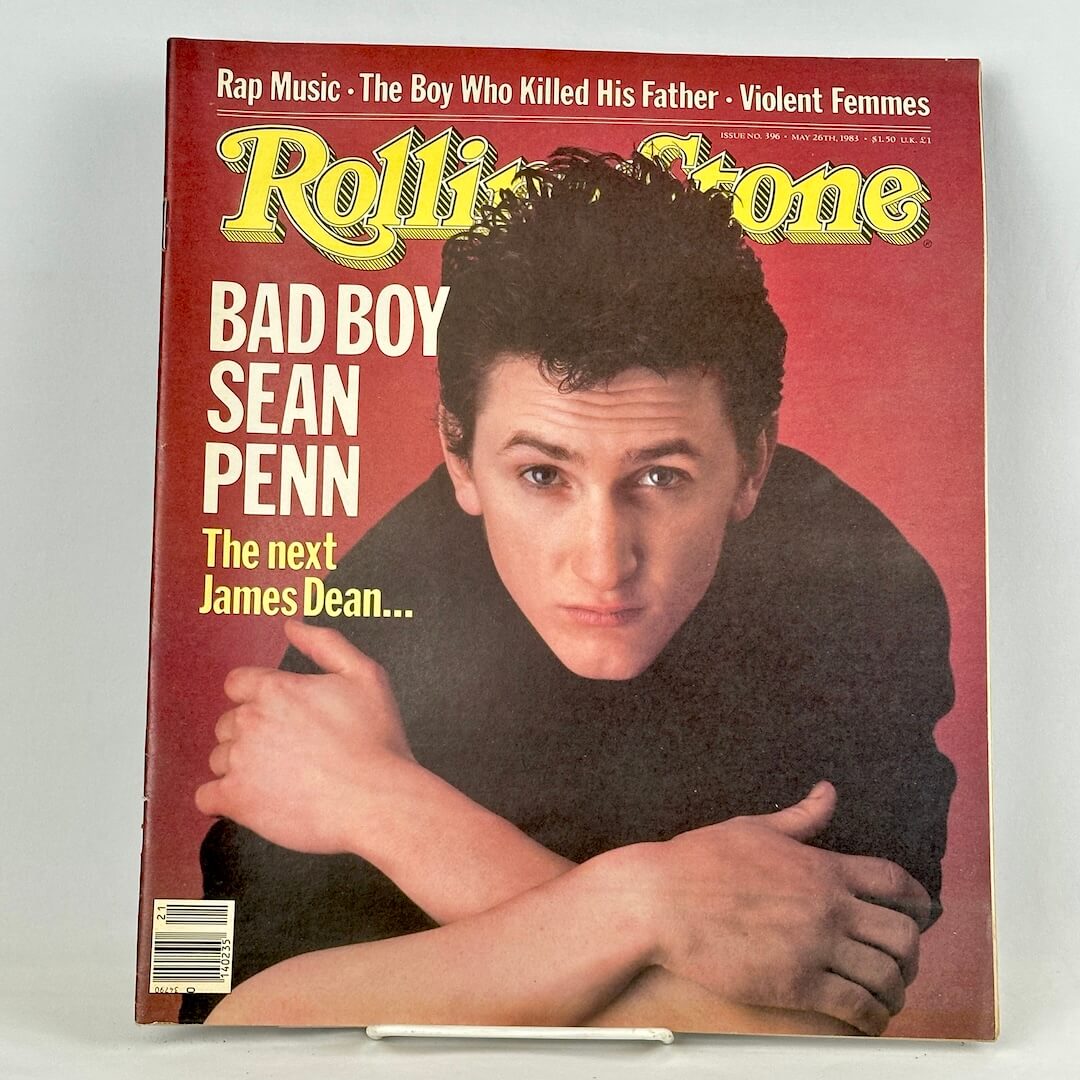Vintage Rolling Stone magazine with red background and portrait of Sean Penn on cover. 