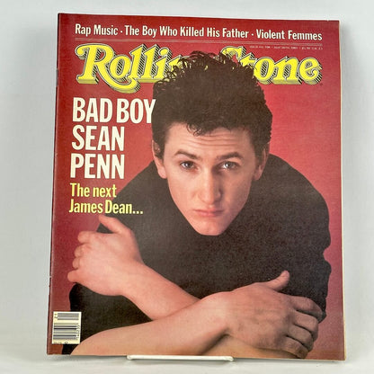 Vintage Rolling Stone magazine with red background and portrait of Sean Penn on cover. 