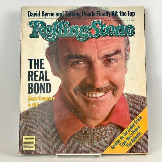 Vintage issue of Rolling Stone magazine featuring up-close portrait of Sean Connery smiling on cover.