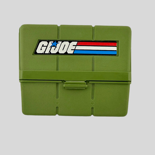 Army green rectangular case with 1986 G.I Joe logo sticker on front. 