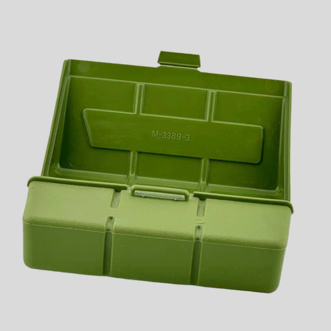Army green rectangular case with snap closure, open to show inside lid with number: M-3389-3. 