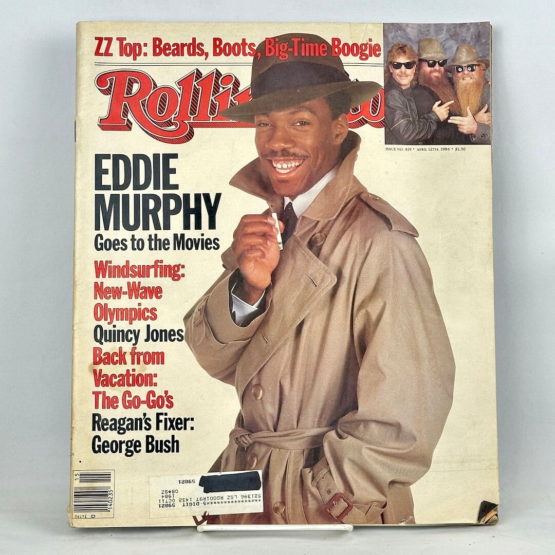 Vintage issue of Rolling Stone magazine with Eddie Murphy in hat and trenchcoat as main cover image. 