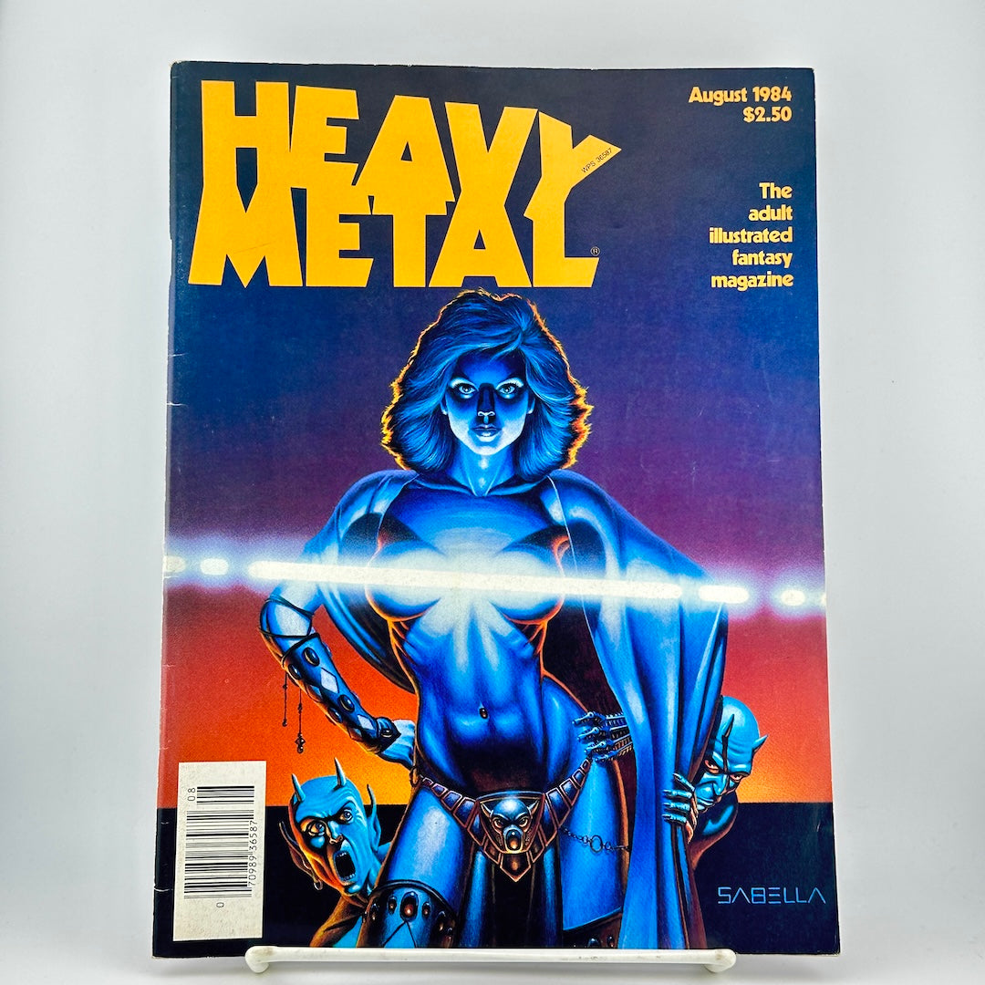 Heavy Metal magazine featuring cover art of a blue-skinned female warrior with a glowing glare across chest. 
