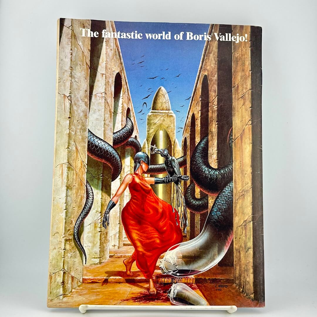 Back cover of magazine with art depicting a woman in a flowing red dress running through a stone corridor.