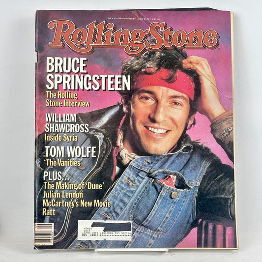 Vintage issue of Rolling Stone magazine with a smiling Bruce Springsteen on the cover. 