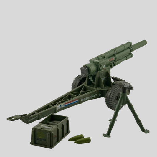 Large green gun mounted on trailer with 2 wheels & tow hitch. Tripod with binoculars, ammo box, & 2 loose bombshells on side.