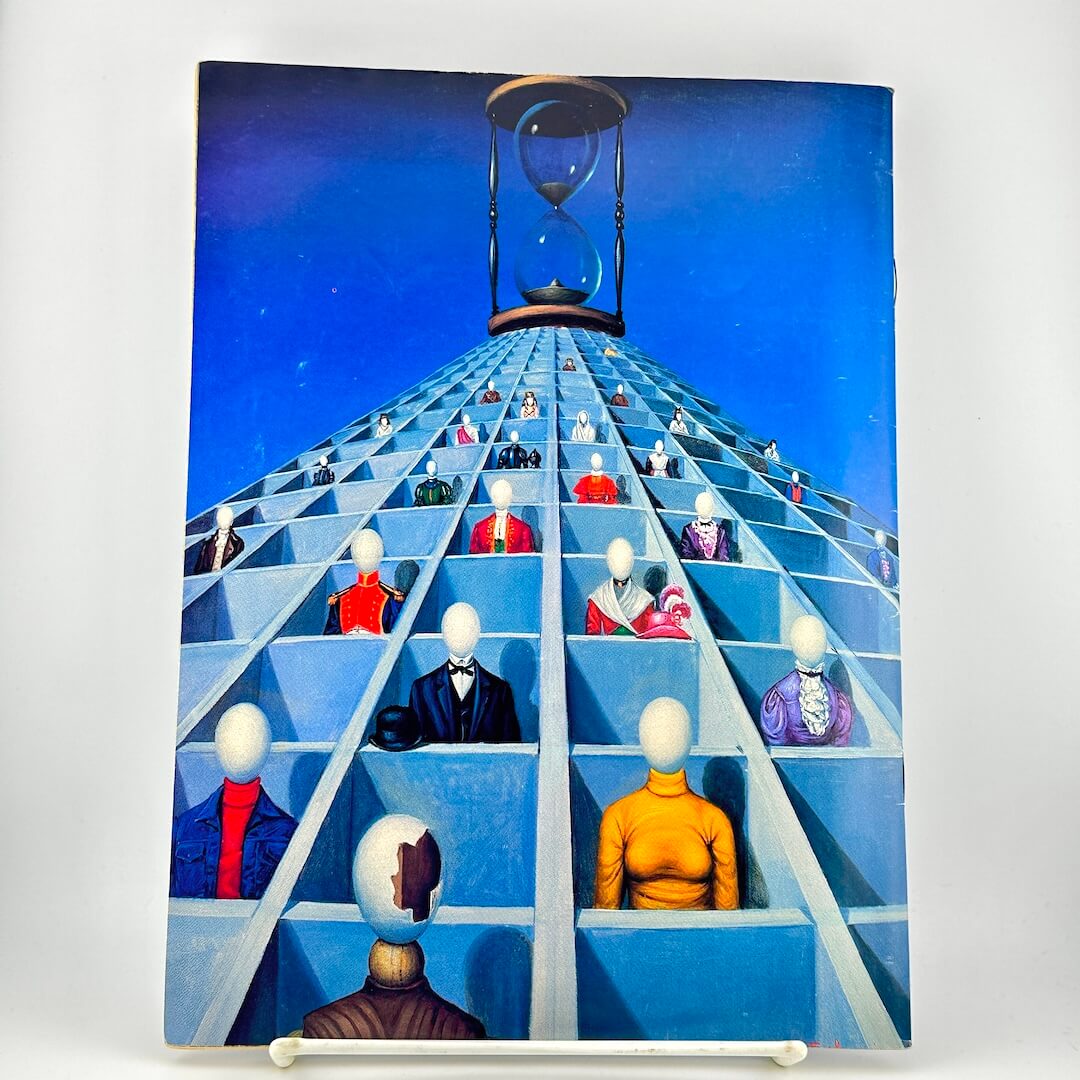 Back cover of magazine with art that depicts a blue hourglass above a pyramid-like grid of mannequin heads. 