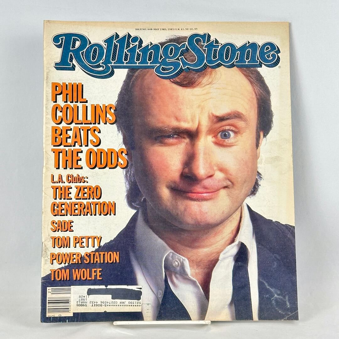 A vintage Rolling Stone magazine cover featuring Phil Collins.