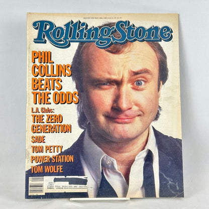 A vintage Rolling Stone magazine cover featuring Phil Collins.