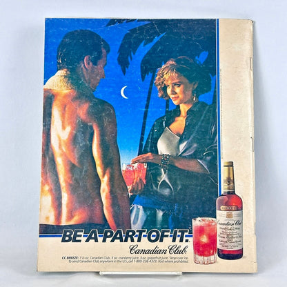 Back cover of magazine with full page ad for Canadian Club whiskey featuring a woman handing a man a drink. 
