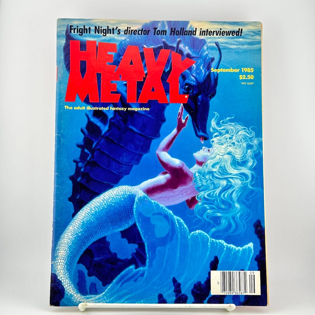 September 1985 issue of Heavy Metal magazine, with a cover illustration of a mermaid & a seahorse in blue underwater tones.