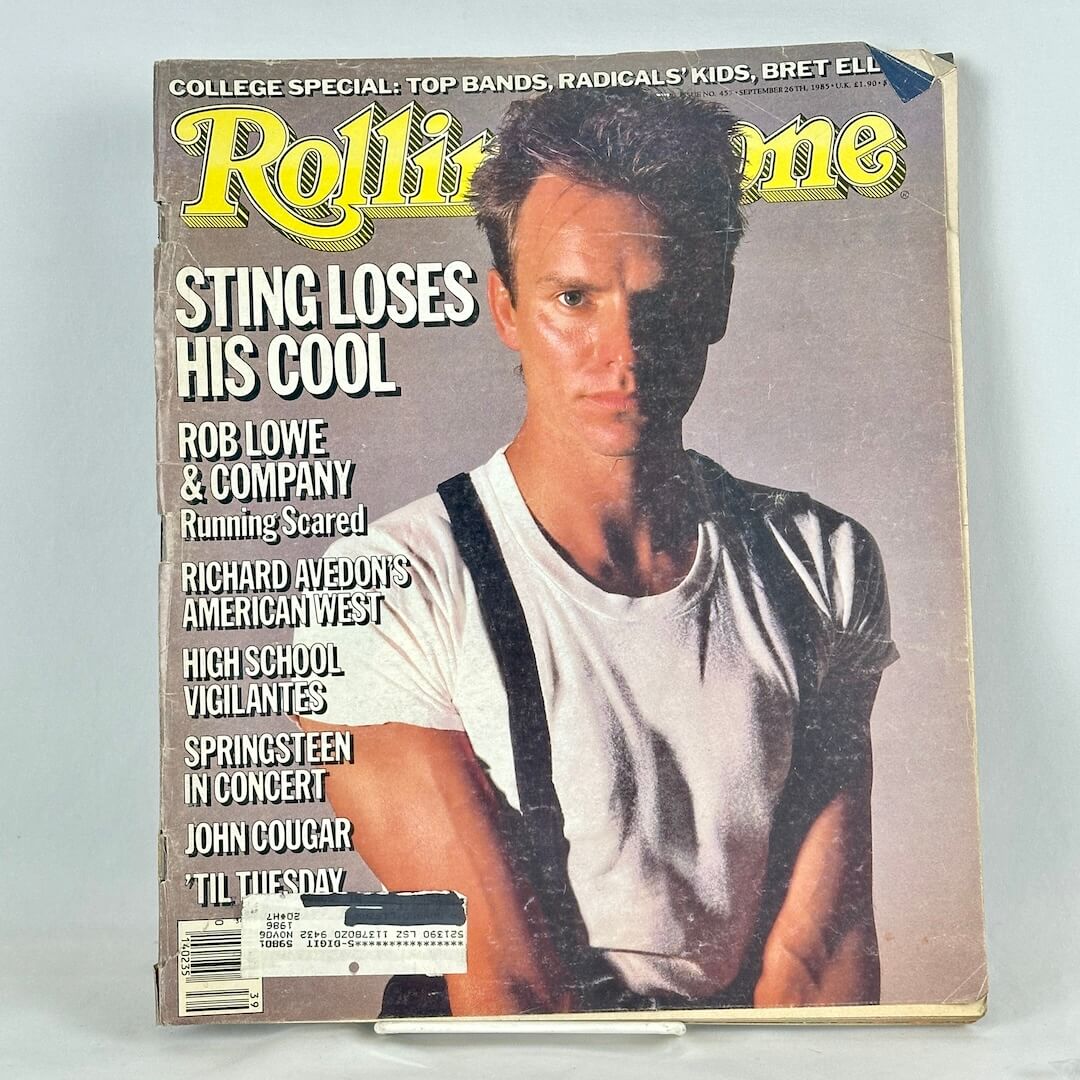 A vintage 1985 issue of Rolling Stone magazine featuring a portrait of Sting wearing a white t-shirt.