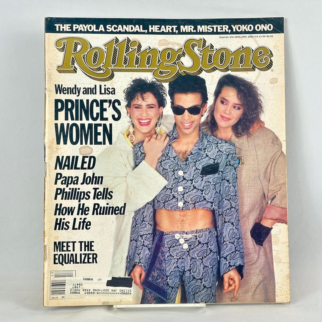 A vintage Rolling Stone magazine cover featuring two women posing together with Prince.