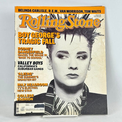 A vintage issue of Rolling Stone magazine featuring a close-up portrait Boy George on cover.