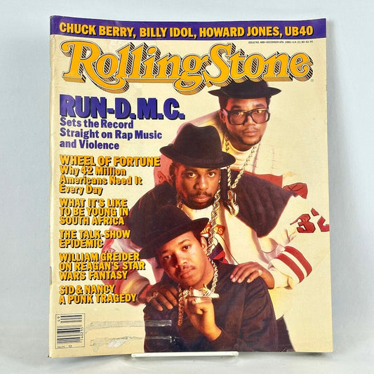 Vintage issue of Rolling Stone magazine with Run-DMC pictured on cover.