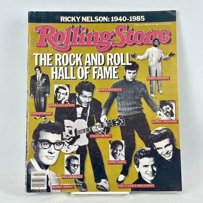 A vintage Rolling Stone magazine cover  featuring a yellow background with a collage of rock and roll legends.