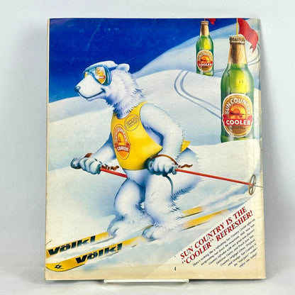 Back cover of magazine with full page ad for Sun Country Cooler drinks featuring illustration of skiing polar bear.