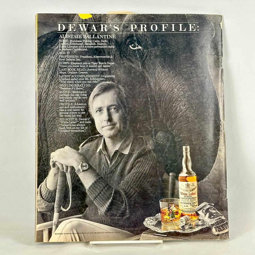 A vintage Dewar's Profile magazine ad featuring Alastair Ballantyne, with a whiskey bottle and glass on the back cover.