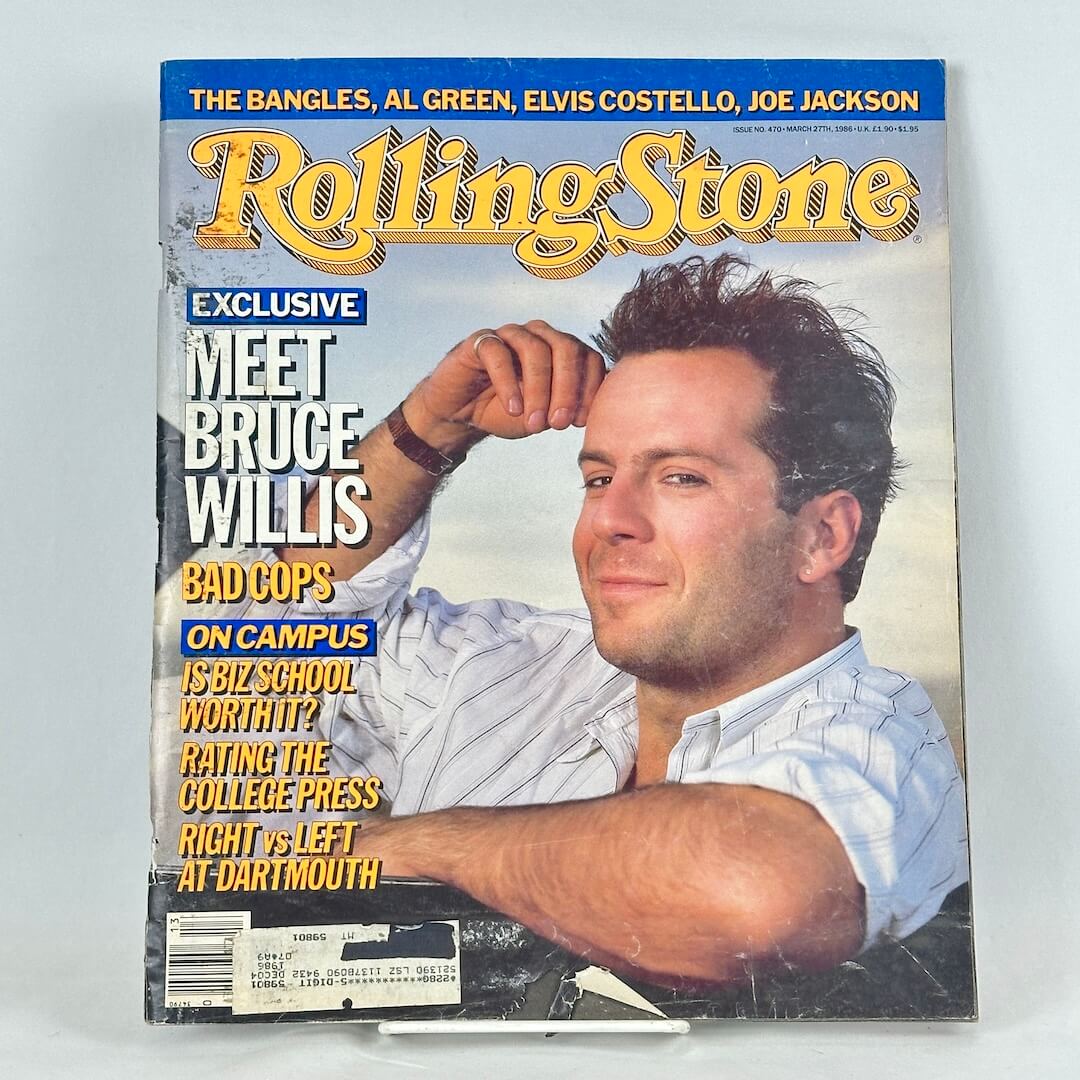 A vintage issue of Rolling Stone magazine featuring Bruce Willis on cover. 