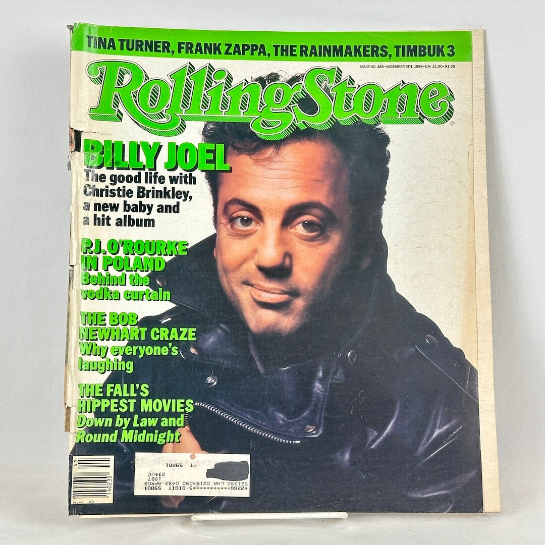 Vintage issue of Rolling Stone magazine with picture of Billy Joel on the cover. Logo in green. 