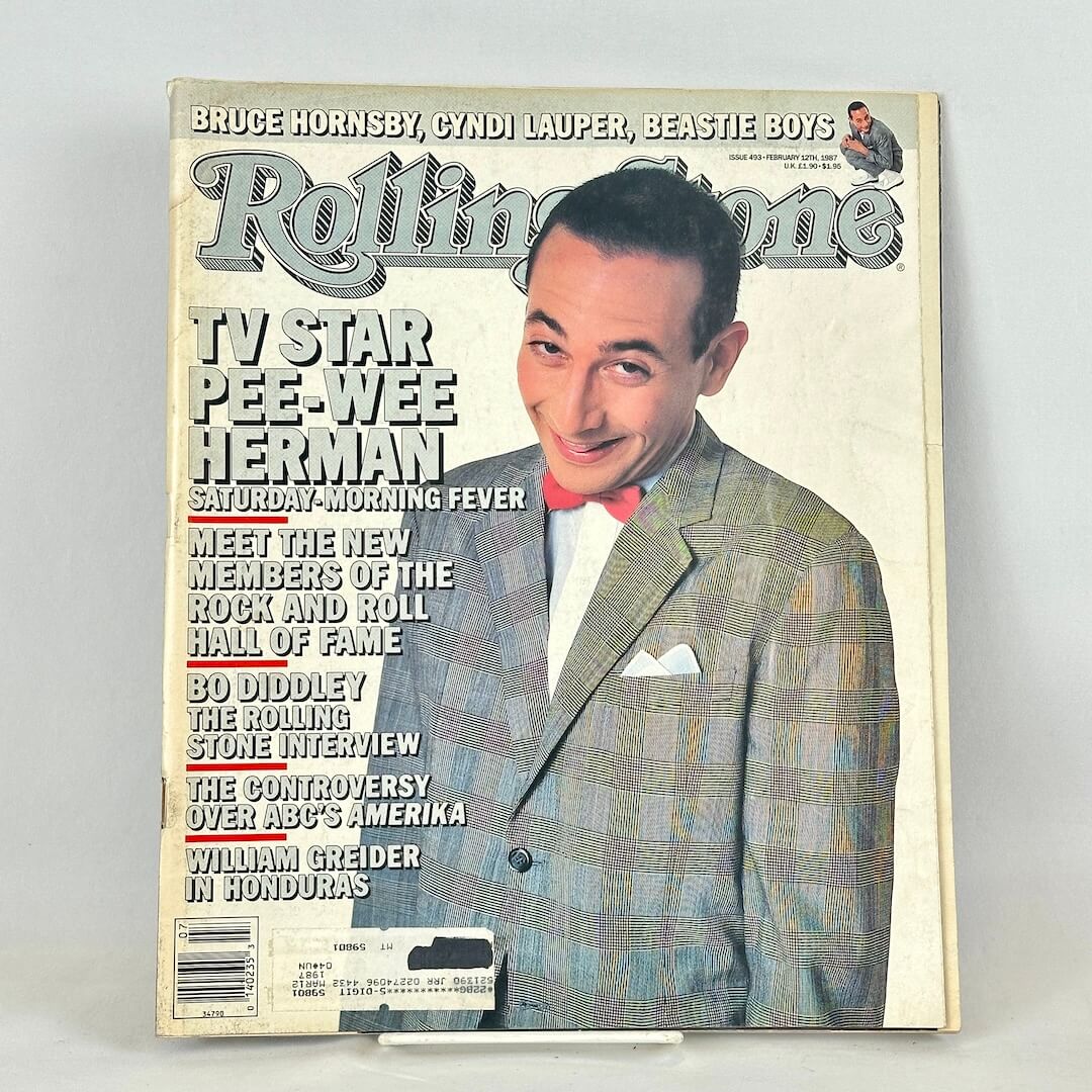Vintage issue of Rolling Stone magazine with Pee-Wee Herman pictured on cover. 