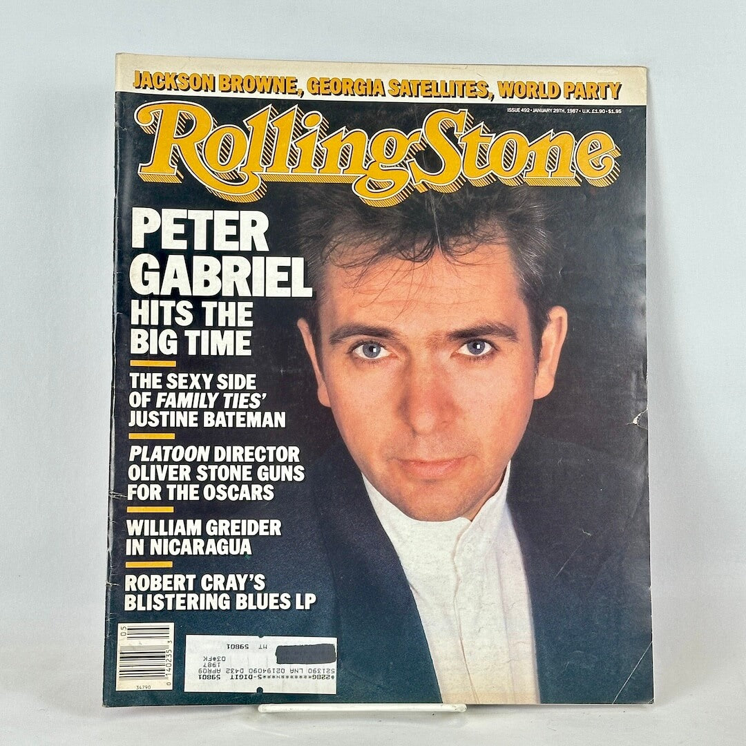 A vintage issue of Rolling Stone magazine featuring Peter Gabriel on the cover.
