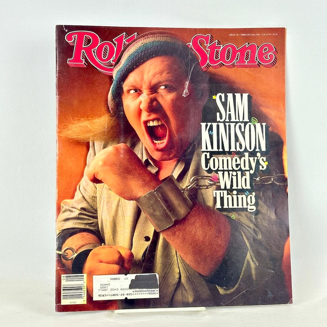 A vintage Rolling Stone magazine cover featuring Sam Kinison with the headline 'Sam Kinison Comedy's Wild Thing.' 