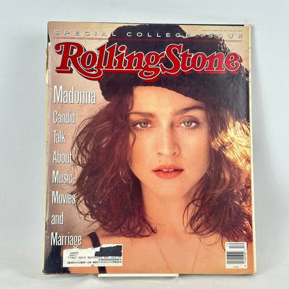 Vintage issue of Rolling Stone magazine featuring Madonna on the cover in hat and brown hair.