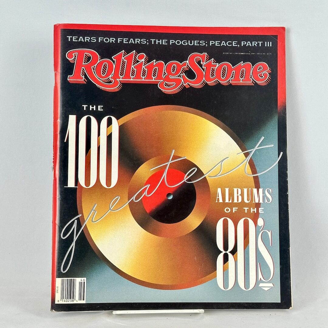 Rolling Stone magazine featuring the cover story 'The 100 Greatest Albums of the 80's' with a large gold vinyl record graphic.