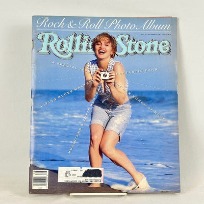 Rolling Stone Rock & Roll Photo Album from September 1989, featuring a photo of a Madonna holding a camera