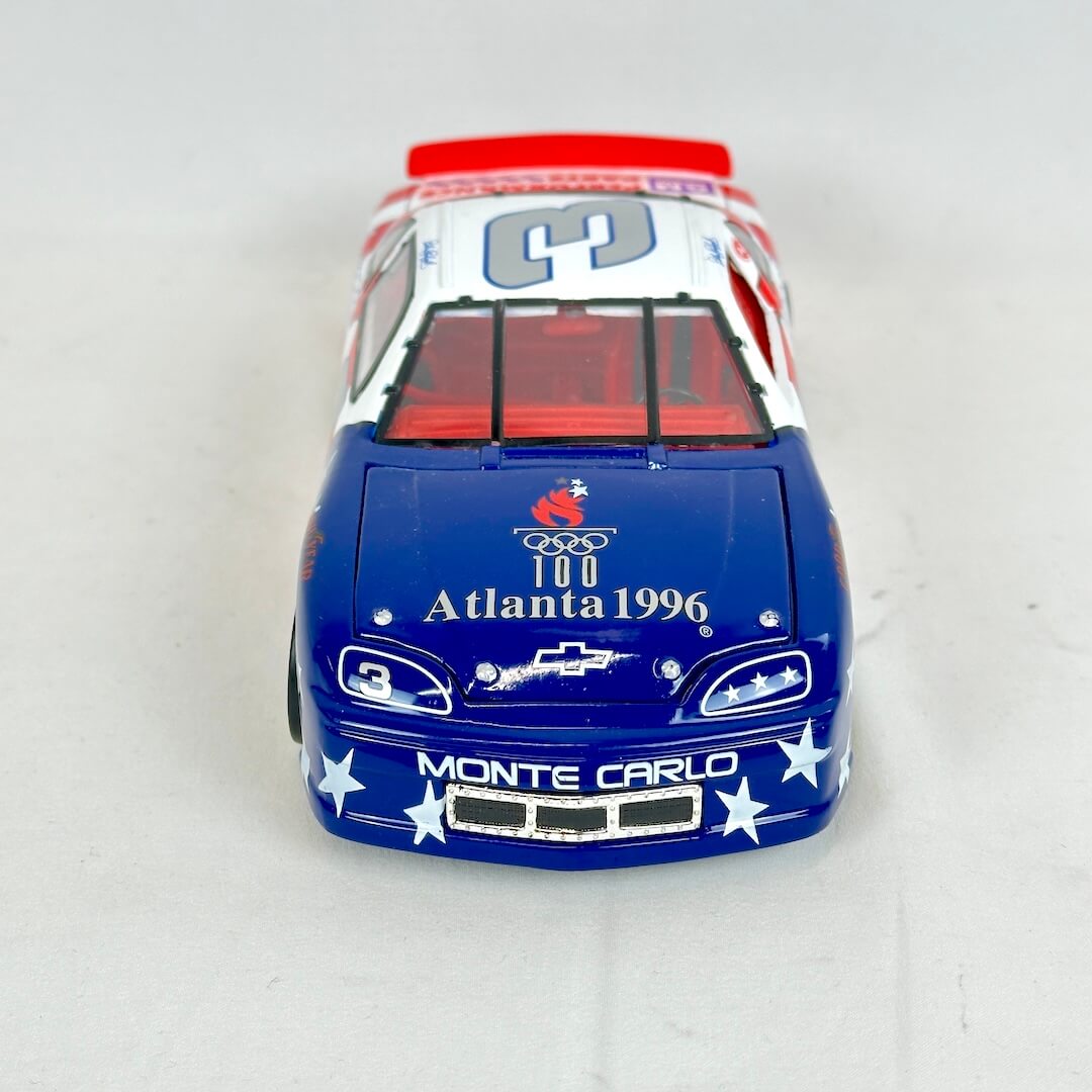 Model car with 'Atlanta 1996' and 'Monte Carlo' branding on a white background