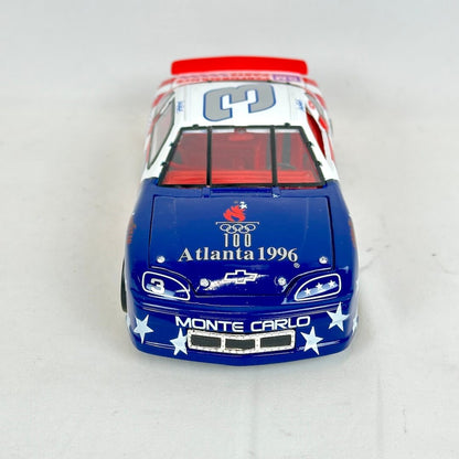 Model car with 'Atlanta 1996' and 'Monte Carlo' branding on a white background