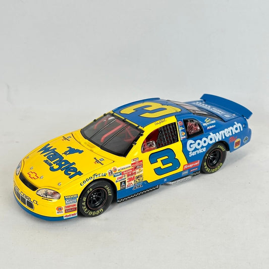 Model race car with multiple sponsor logos on a light gray background