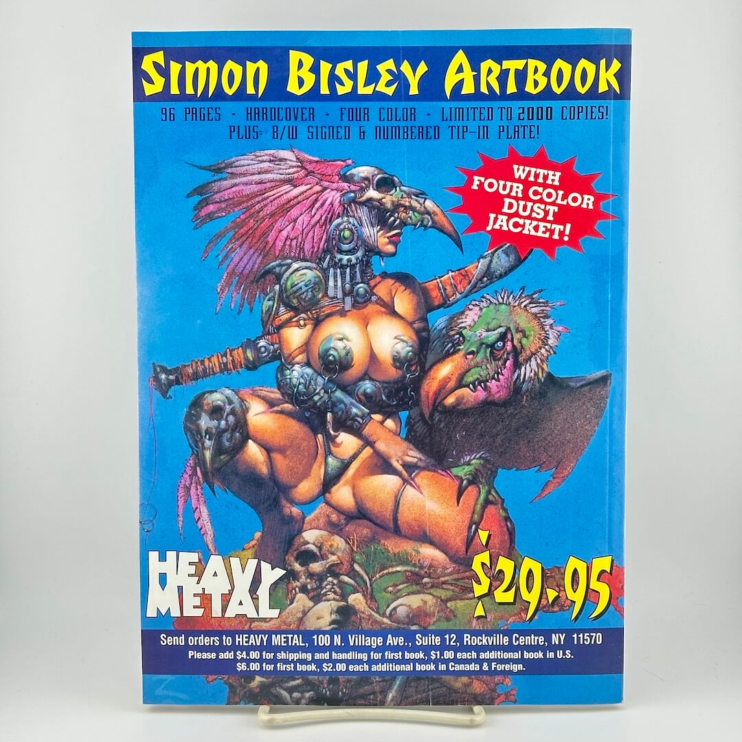 Back cover of magazine with ad for Simon Bisley Artbook with scantily clad woman in crouching position. 