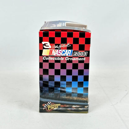 NASCAR collectible ornament packaging with checkered pattern and branding on a white background