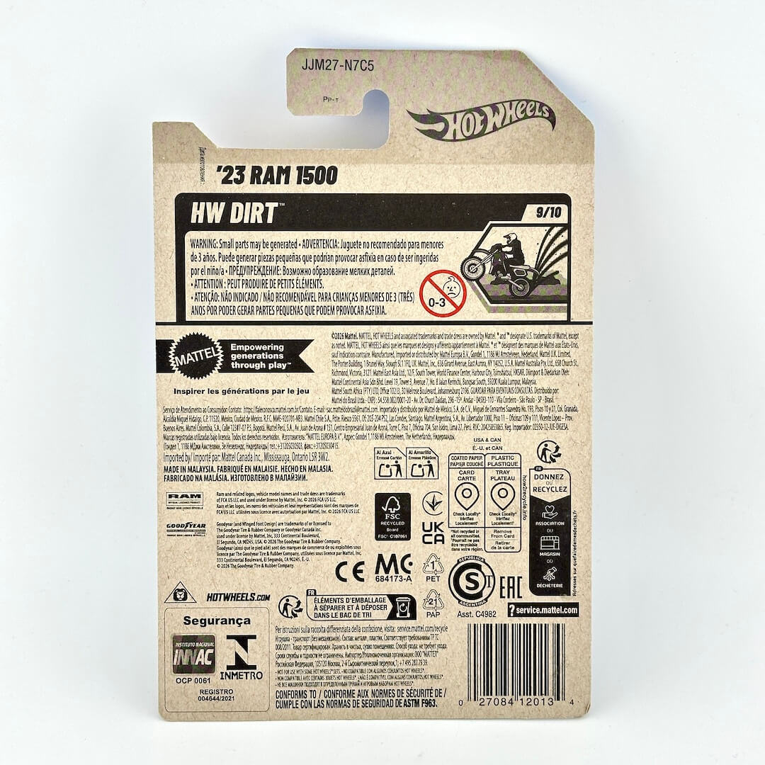 The back of a Hot Wheels HW Dirt '23 Ram 1500 toy packaging card featuring product details and warning labels. 