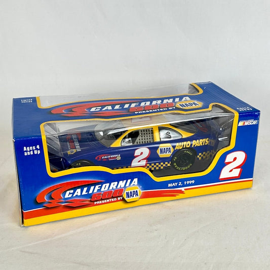 A boxed diecast model race car displayed in its retail packaging. The car is blue with yellow and white graphics.