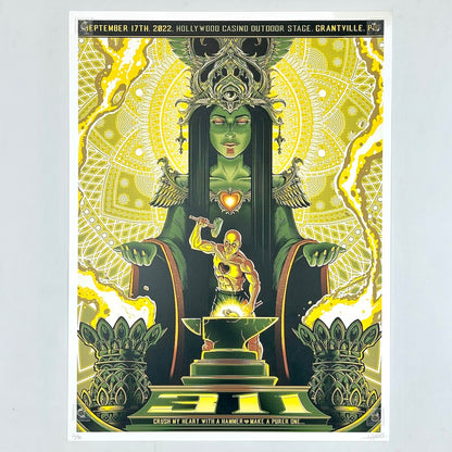 Decorative poster with green and yellow design featuring a central figure and intricate patterns.
