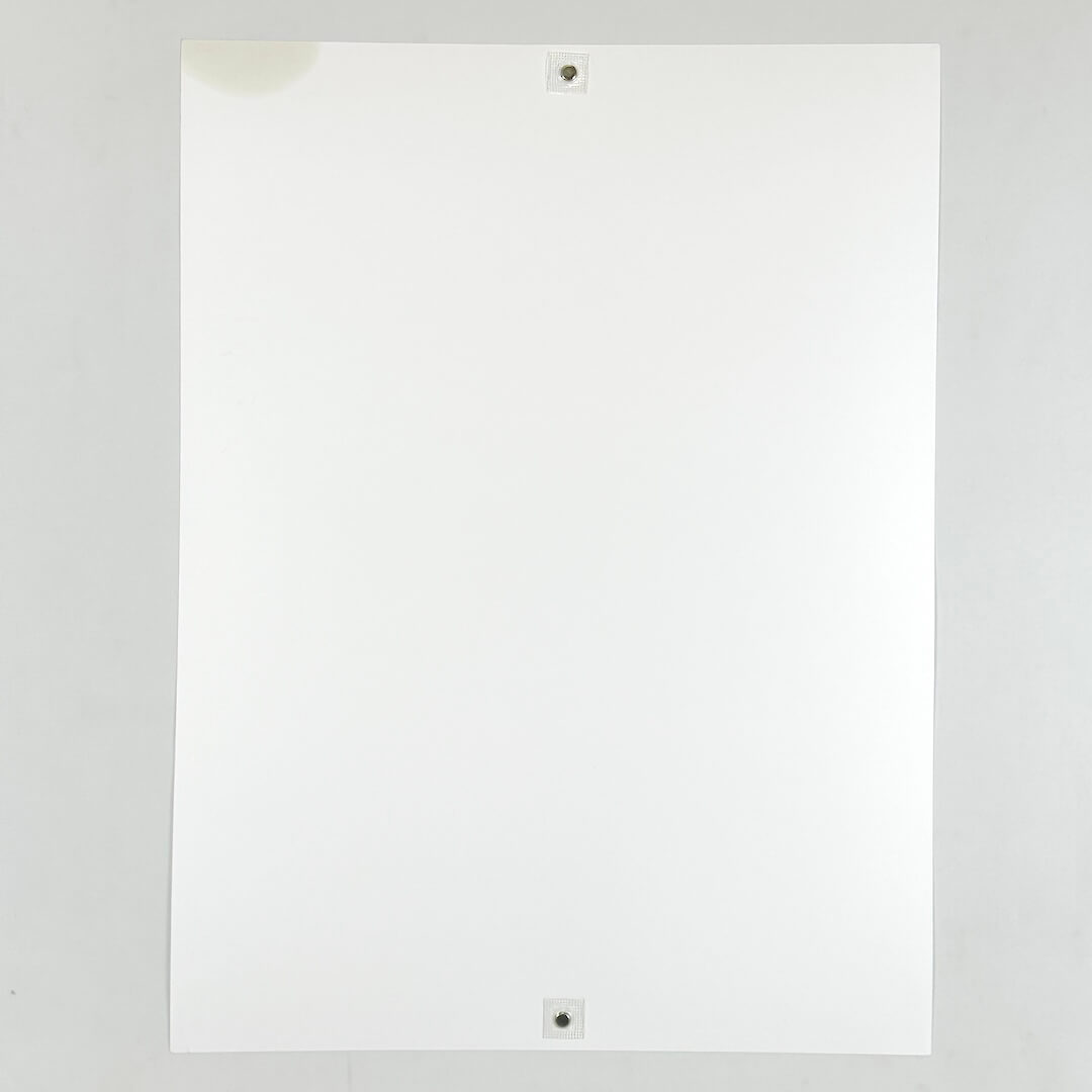 Backside of poster to show stain placement and extent, as well as no other damage. 