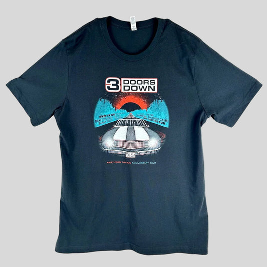 A black short-sleeve t-shirt with a graphic print on the front, featuring the text '3 DOORS DOWN' above an illustration.
