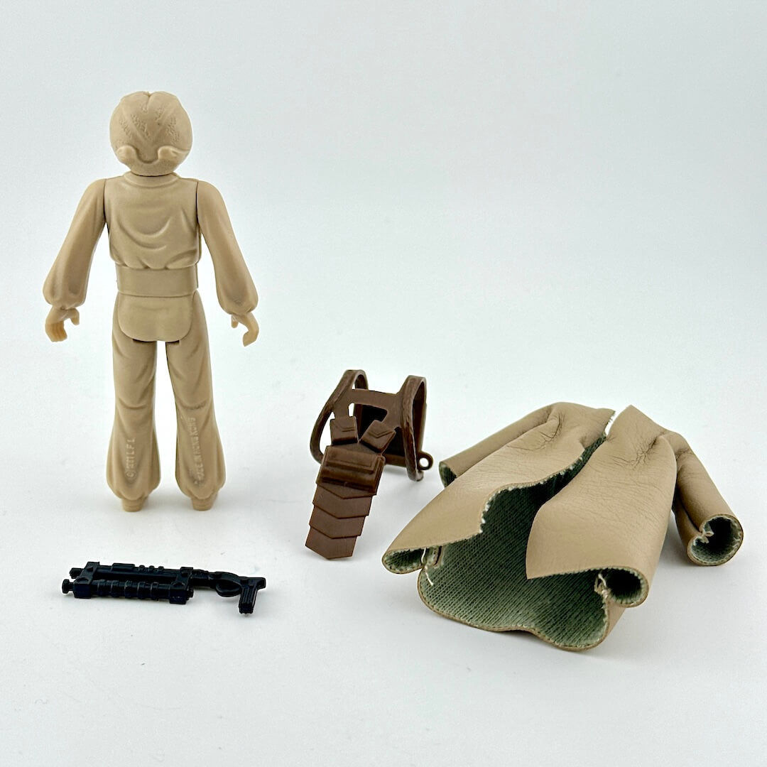 Toy figure with accessories on a white background