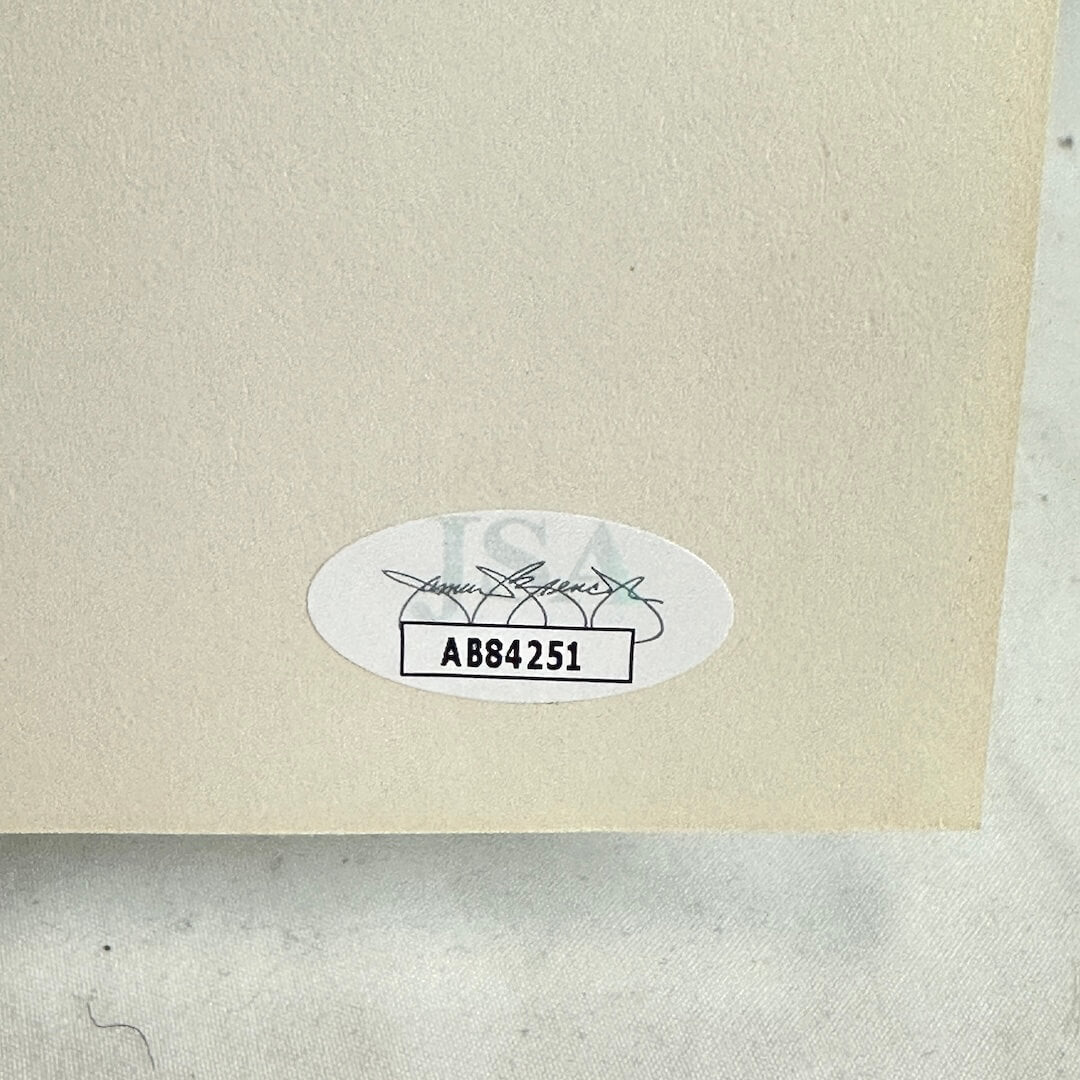 Product label with a serial number on a textured beige background