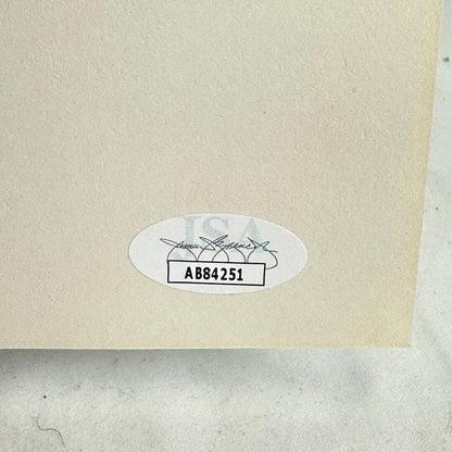 Product label with a serial number on a textured beige background